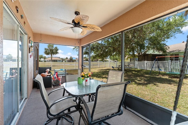 11449 Crestlake Village Dr, Riverview, FL 33569 - sunroom / solarium with a ceiling fan and outdoor dining space