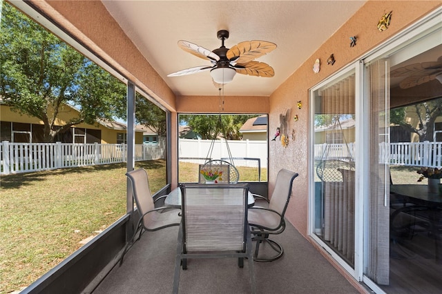 11449 Crestlake Village Dr, Riverview, FL 33569 - sunroom featuring a ceiling fan and outdoor dining space