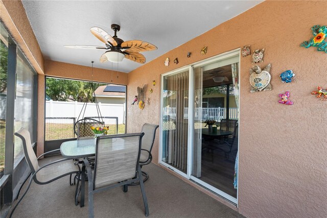 11449 Crestlake Village Dr, Riverview, FL 33569 - sunroom featuring outdoor dining area and ceiling fan