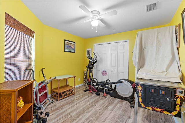 11449 Crestlake Village Dr, Riverview, FL 33569 - exercise area featuring ceiling fan, baseboards, wood finished floors, and visible vents