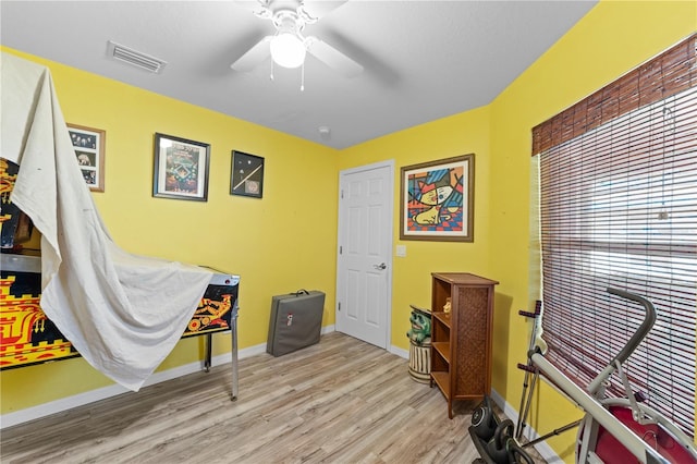 11449 Crestlake Village Dr, Riverview, FL 33569 - interior space featuring wood finished floors, visible vents, baseboards, and ceiling fan