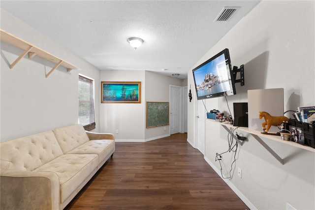 11449 Crestlake Village Dr, Riverview, FL 33569 - living room featuring baseboards, wood finished floors, visible vents, and a textured ceiling