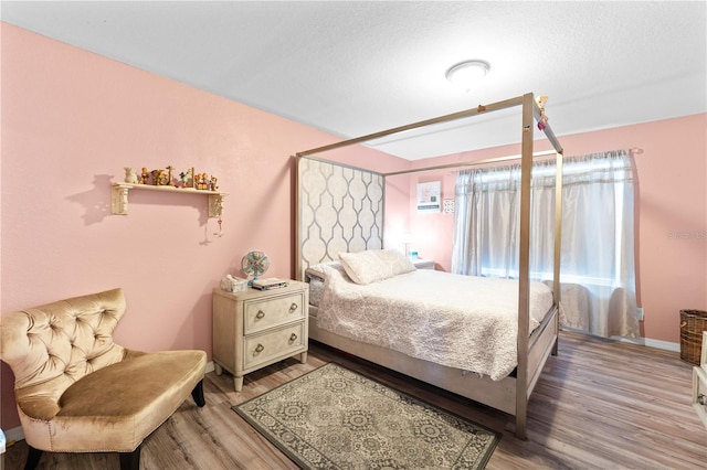 11449 Crestlake Village Dr, Riverview, FL 33569 - bedroom with wood finished floors and baseboards