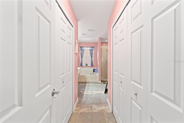 11449 Crestlake Village Dr, Riverview, FL 33569 - hall with visible vents and marble finish floor
