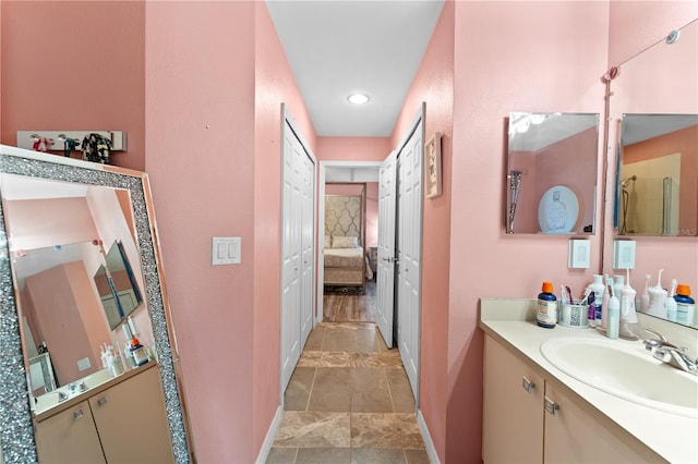 11449 Crestlake Village Dr, Riverview, FL 33569 - full bathroom with ensuite bath, vanity, and baseboards