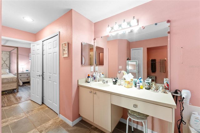 11449 Crestlake Village Dr, Riverview, FL 33569 - ensuite bathroom with baseboards, vanity, and connected bathroom
