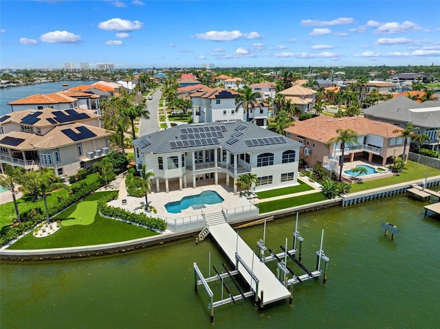 6202 Pasadena Point Blvd, Gulfport, FL 33707 - aerial perspective of suburban area featuring a pool and a nearby body of water