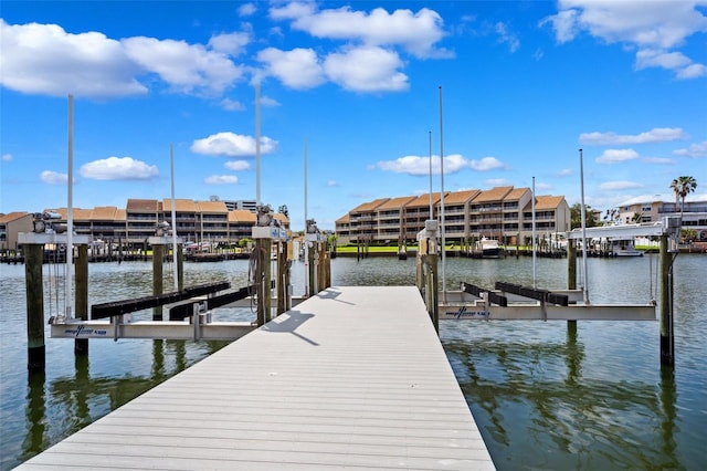 6202 Pasadena Point Blvd, Gulfport, FL 33707 - dock area featuring boat lift, a water view, and a residential view