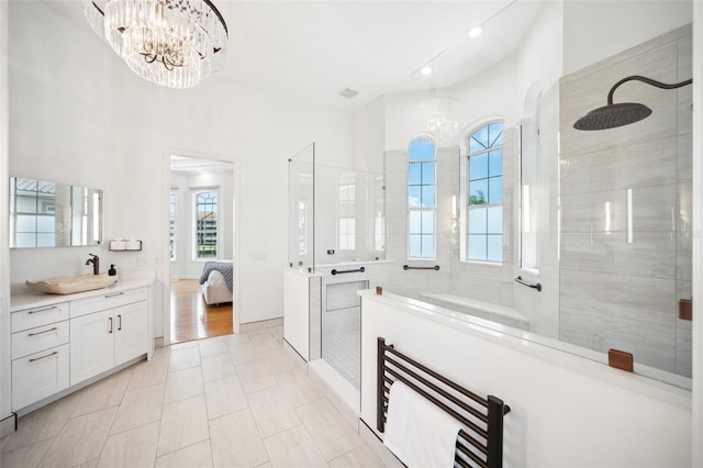 6202 Pasadena Point Blvd, Gulfport, FL 33707 - full bathroom featuring walk in shower, vanity, a chandelier, recessed lighting, and tile patterned flooring