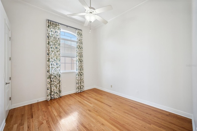6202 Pasadena Point Blvd, Gulfport, FL 33707 - unfurnished room with light wood-type flooring, baseboards, crown molding, and ceiling fan