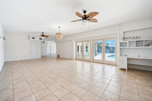 6202 Pasadena Point Blvd, Gulfport, FL 33707 - unfurnished living room featuring a ceiling fan, light tile patterned floors, and an office area