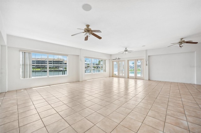 6202 Pasadena Point Blvd, Gulfport, FL 33707 - empty room featuring ceiling fan and light tile patterned floors