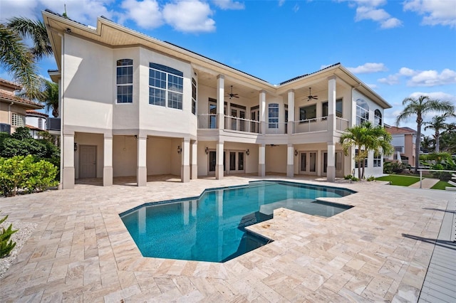 6202 Pasadena Point Blvd, Gulfport, FL 33707 - swimming pool with a ceiling fan, a patio, and french doors