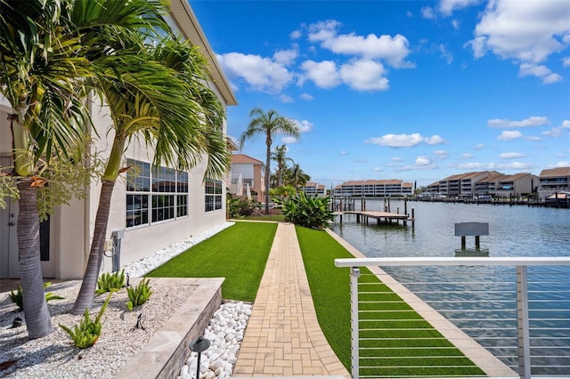 6202 Pasadena Point Blvd, Gulfport, FL 33707 - dock featuring a water view and a yard