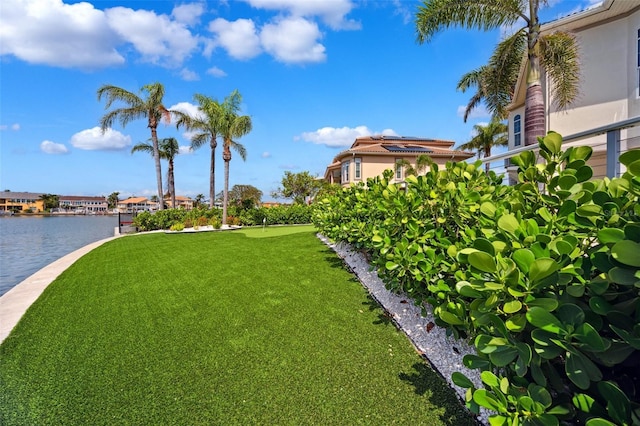 6202 Pasadena Point Blvd, Gulfport, FL 33707 - view of yard featuring an area to practice putting and a water view