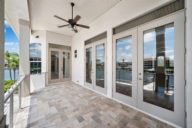 6202 Pasadena Point Blvd, Gulfport, FL 33707 - view of patio featuring french doors, a water view, and ceiling fan