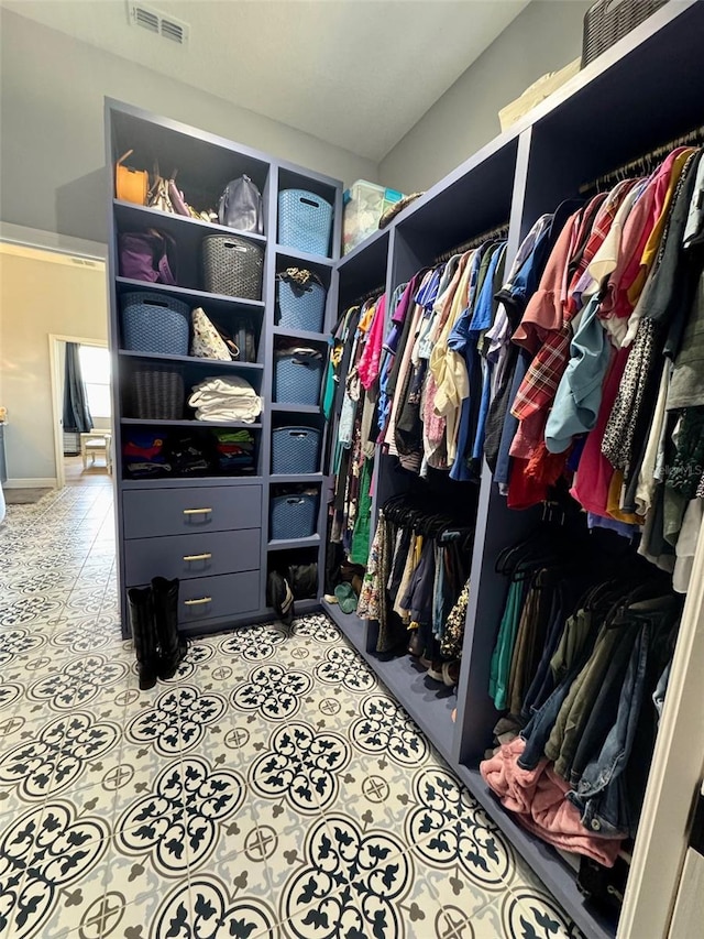 spacious closet with visible vents