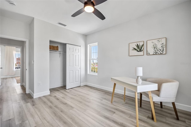 13117 4th St E, Madeira Beach, FL 33708 - office space featuring healthy amount of natural light, wood finished floors, and a ceiling fan