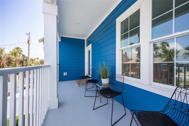 13117 4th St E, Madeira Beach, FL 33708 - balcony featuring a porch