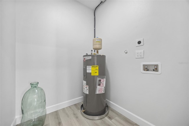 13117 4th St E, Madeira Beach, FL 33708 - utility room with water heater