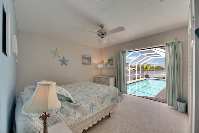927 Golf Island Dr, Apollo Beach, FL 33572 - carpeted bedroom featuring access to exterior, ceiling fan, and a sunroom