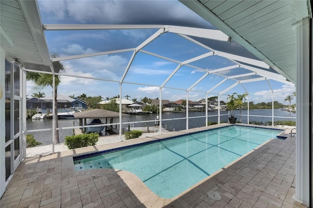 927 Golf Island Dr, Apollo Beach, FL 33572 - swimming pool with a water view, a patio area, and glass enclosure