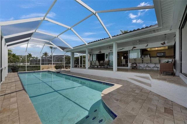 927 Golf Island Dr, Apollo Beach, FL 33572 - outdoor pool with a patio area and glass enclosure
