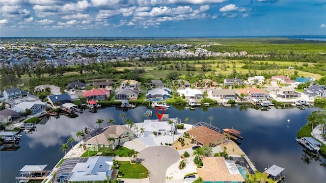 927 Golf Island Dr, Apollo Beach, FL 33572 - aerial overview of property's location with a nearby body of water and nearby suburban area