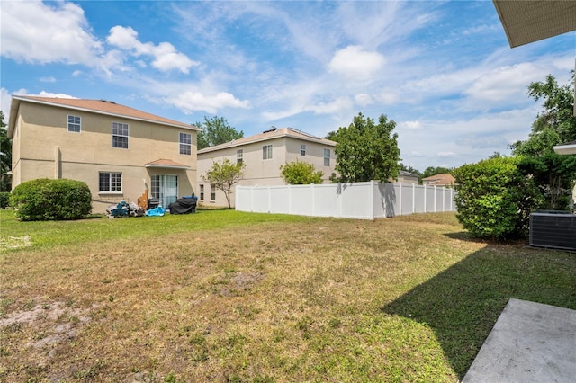 18837 Litzau Ln, Land O Lakes, FL 34638 - view of yard featuring central air condition unit