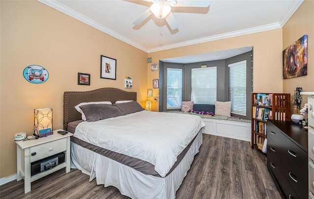 bedroom featuring ornamental molding, dark wood-style flooring, and ceiling fan