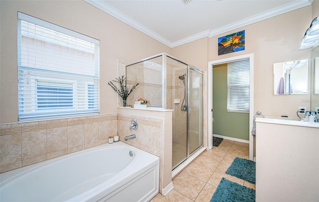 full bathroom with crown molding, vanity, a bath, and a stall shower