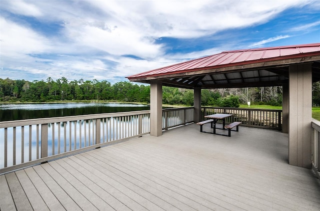 deck with a water view and a gazebo