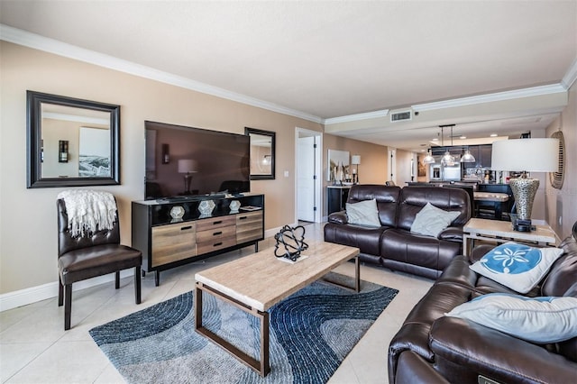 19418 Gulf Blvd Unit 507, Indian Shores, FL 33785 - living area with ornamental molding and light tile patterned flooring