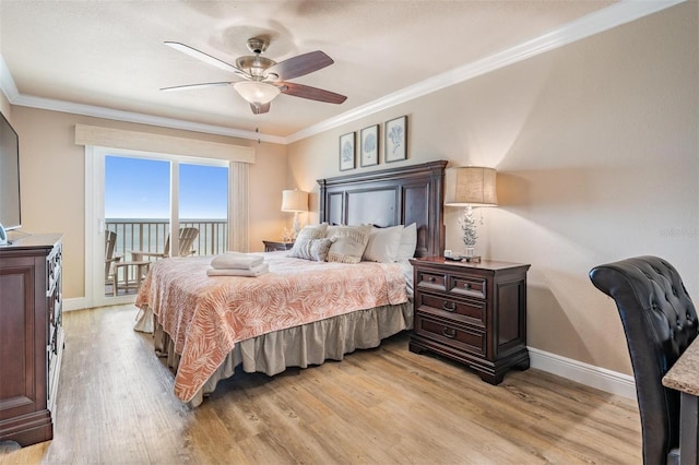 19418 Gulf Blvd Unit 507, Indian Shores, FL 33785 - bedroom featuring crown molding, light wood-style floors, access to outside, and a ceiling fan