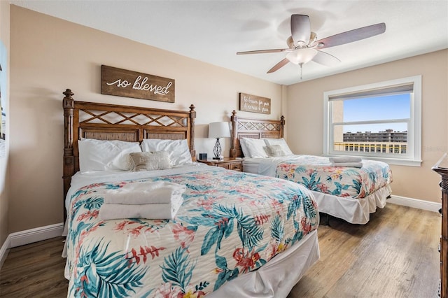 19418 Gulf Blvd Unit 507, Indian Shores, FL 33785 - bedroom featuring wood finished floors and ceiling fan