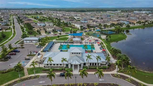 drone / aerial view with a water view
