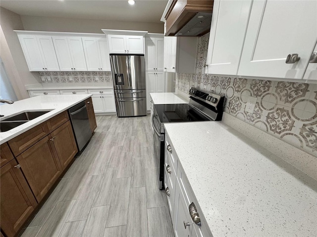 37565 Teri Ct, Dade City, FL 33525 - kitchen featuring tasteful backsplash, a sink, extractor fan, stainless steel appliances, and light countertops