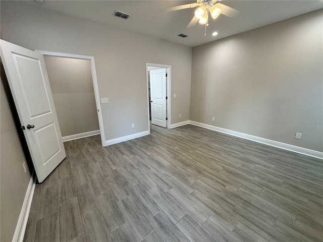 37565 Teri Ct, Dade City, FL 33525 - unfurnished bedroom with baseboards, wood finished floors, visible vents, and recessed lighting