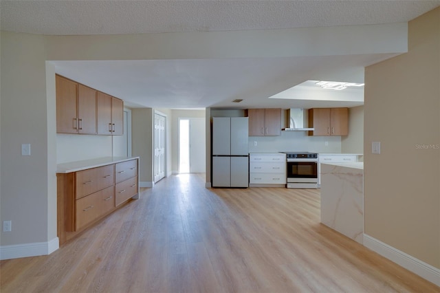 6528 Santiago Ct, Apollo Beach, FL 33572 - kitchen featuring baseboards, freestanding refrigerator, electric range oven, and wall chimney range hood