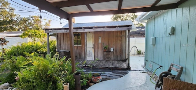 view of outdoor structure with an outdoor structure and fence