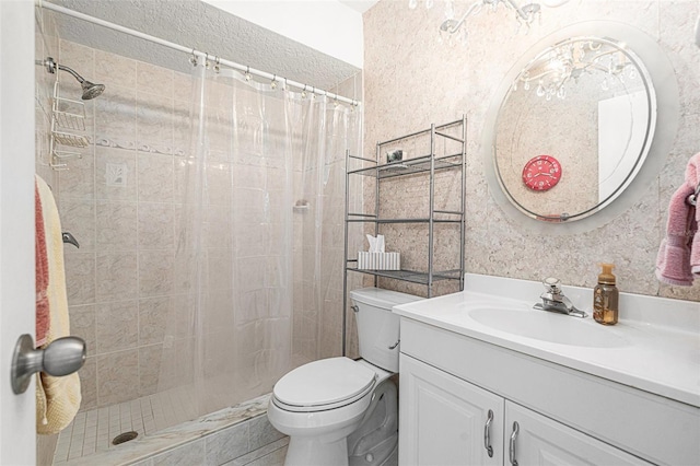 full bath with a shower stall, toilet, and vanity