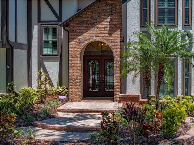 13004 Bell Creek Chase, Riverview, FL 33569 - doorway to property with french doors and stucco siding