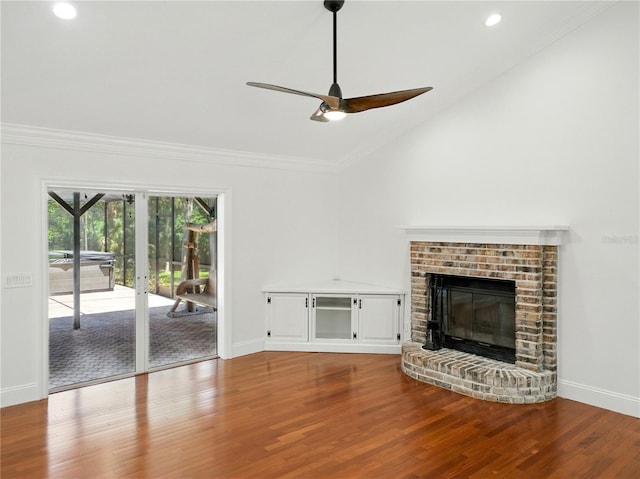 13004 Bell Creek Chase, Riverview, FL 33569 - unfurnished living room featuring vaulted ceiling, wood finished floors, a ceiling fan, and baseboards