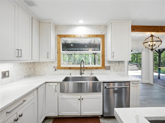 13004 Bell Creek Chase, Riverview, FL 33569 - kitchen with white cabinets, dark wood-style floors, dishwasher, a sink, and tasteful backsplash