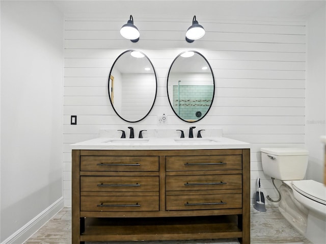 13004 Bell Creek Chase, Riverview, FL 33569 - full bathroom with baseboards, a sink, and wooden walls