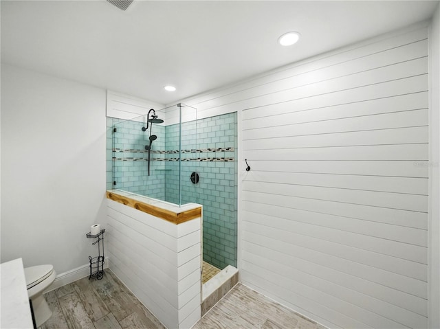 13004 Bell Creek Chase, Riverview, FL 33569 - bathroom with toilet, wood finished floors, a walk in shower, and recessed lighting