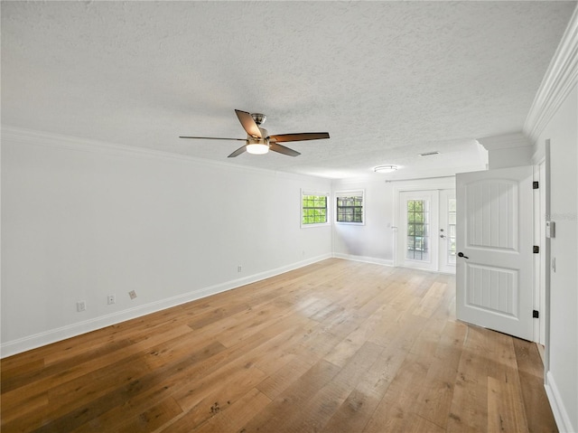 13004 Bell Creek Chase, Riverview, FL 33569 - spare room with a textured ceiling, light wood-type flooring, ceiling fan, baseboards, and ornamental molding