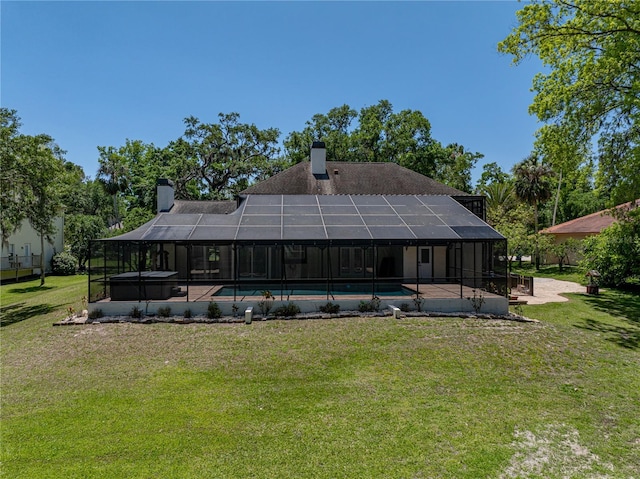 13004 Bell Creek Chase, Riverview, FL 33569 - back of house featuring an outdoor pool, a lanai, a chimney, and a patio