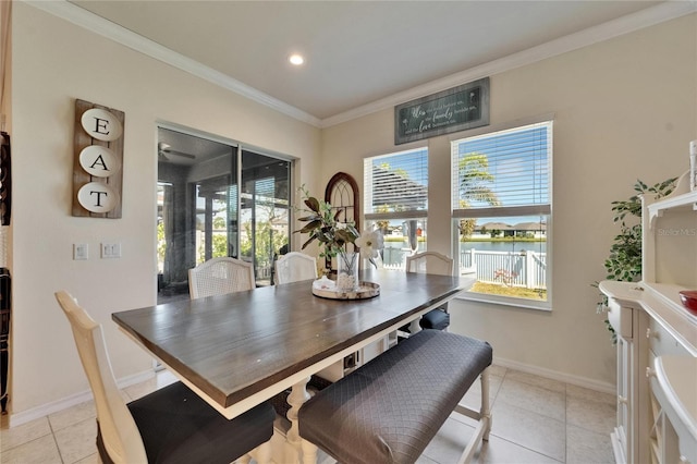 dining room with light tile patterned floors, baseboards, recessed lighting, and ornamental molding
