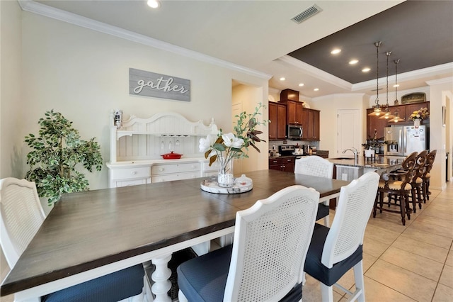 dining area featuring recessed lighting, visible vents, ornamental molding, and light tile patterned floors